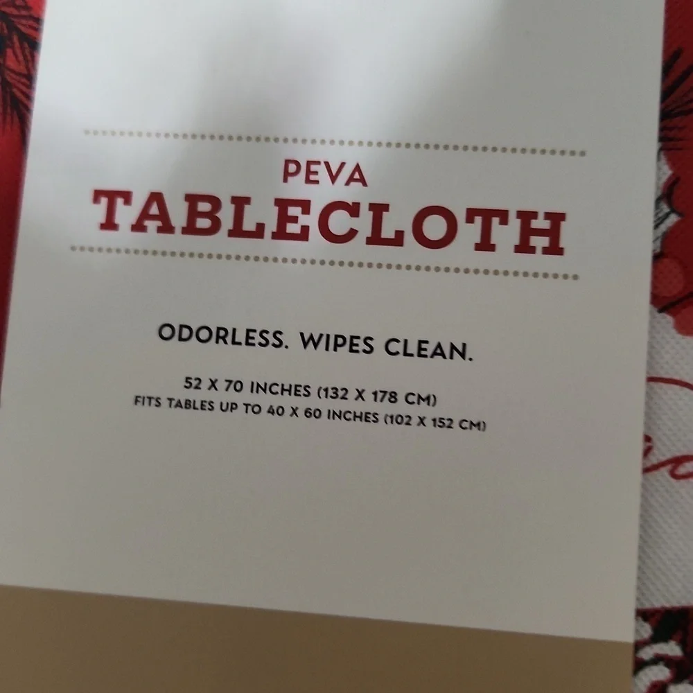 NEW Christmas table cloth 52x70 inches Fits table up to 40 x 60 Feliz Navidad